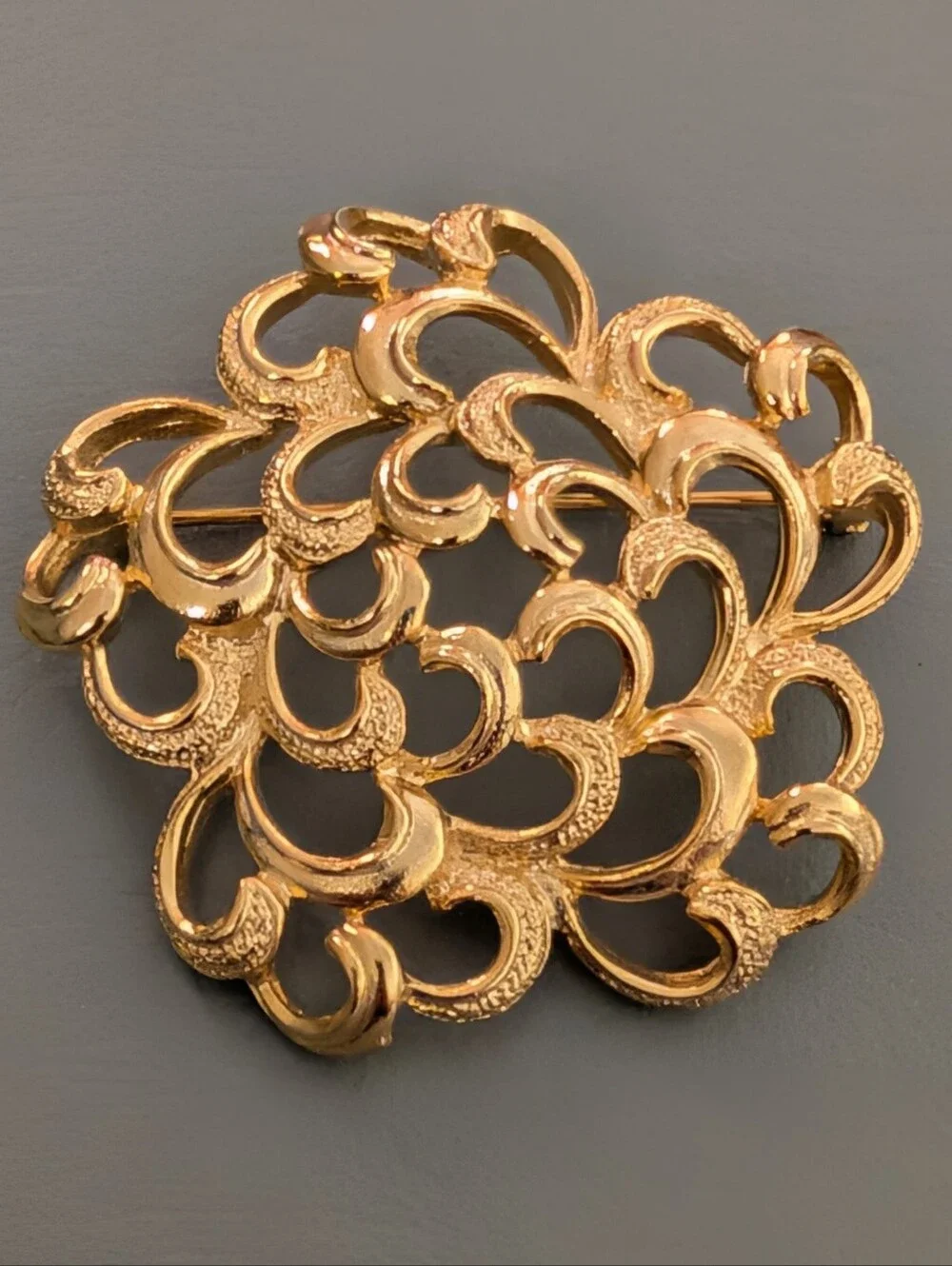 Gold Tone Textured Floral Openwork Or Scroll Design Brooch